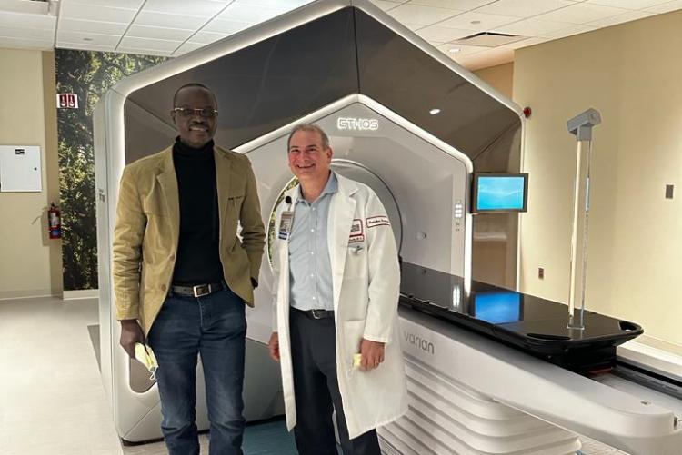 Posing in front of CT-based adaptive Radiation Therapy Machine with Prof. Eric Horwitz, Chairman Department of Radiation oncology at Fox Chase Cancer Center