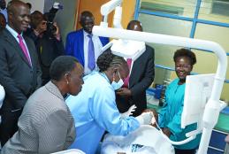 Prof. Elizabeth Dimba demonstrates how the dental chair is operated.